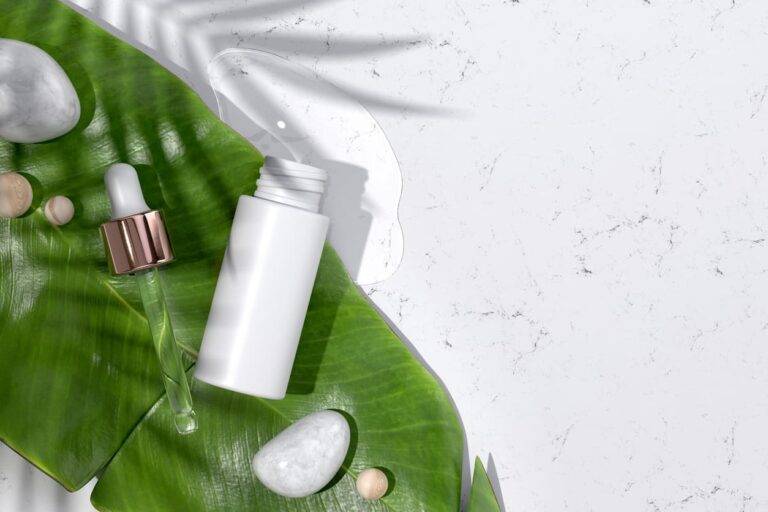 dropper bottle mockup. top view of opened hyaluronic acid serum bottle and tropical leaf. natural organic beauty product for cosmetic magazine. ad template with copy space for text. 3d illustration.